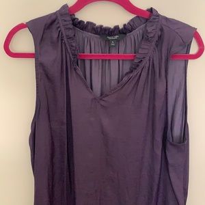 Slight high low purple top